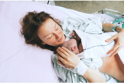 mother holding her newborn baby