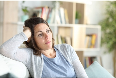 portrait of woman thinking at home