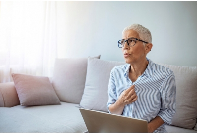 woman experiencing hot flash