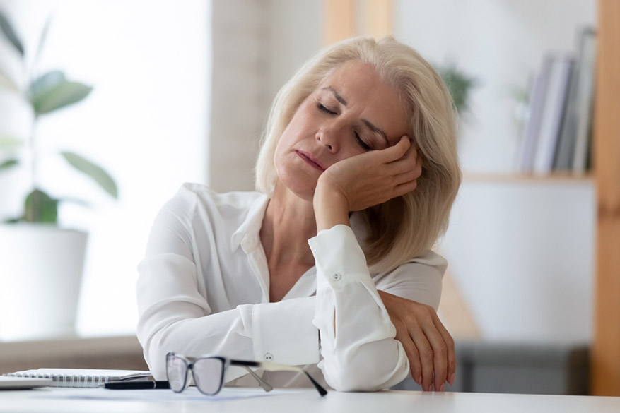 exhausted older woman