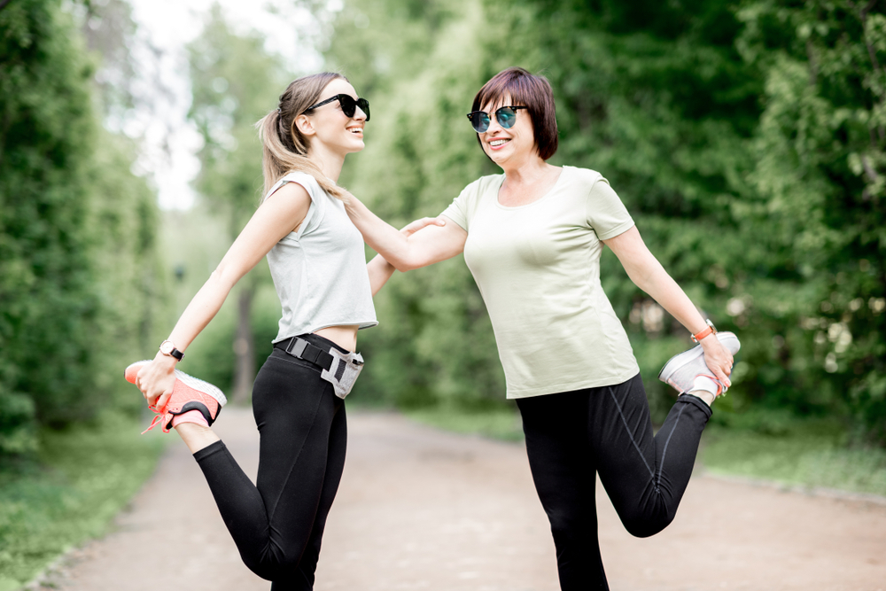 women stretching before a run