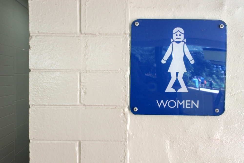 woman's bathroom sign