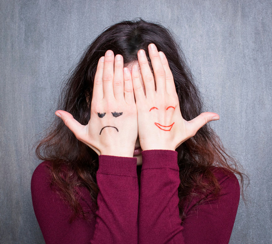 woman covering her face