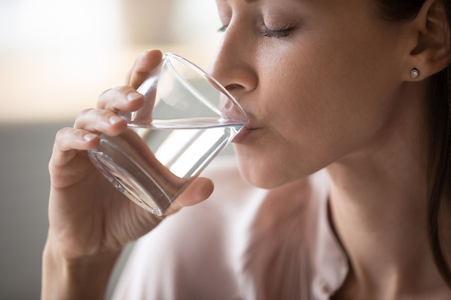 woman drinking water