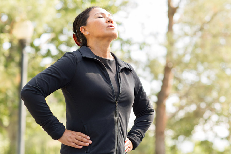 woman meditating breathing deeply