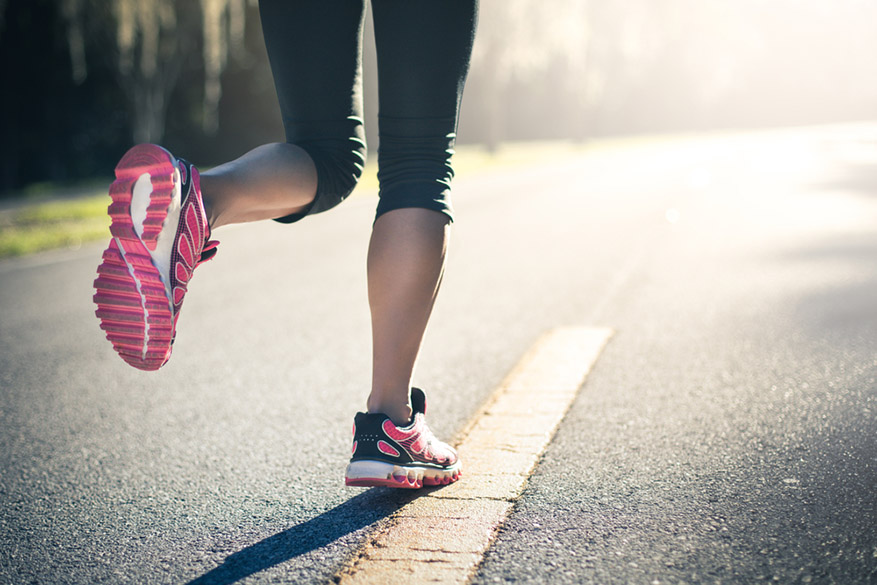 woman running on the road