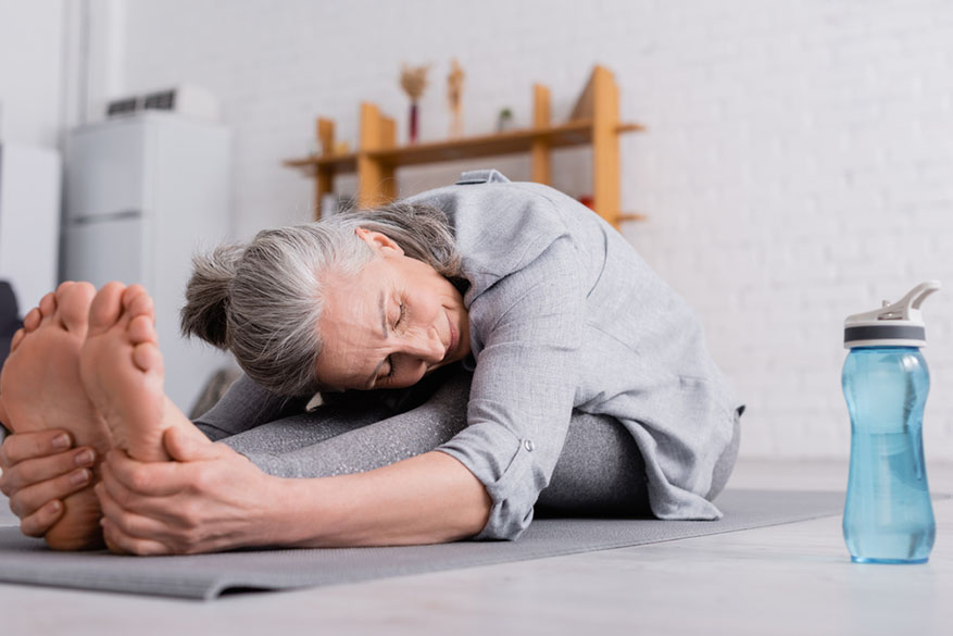 woman stretching hamstrings